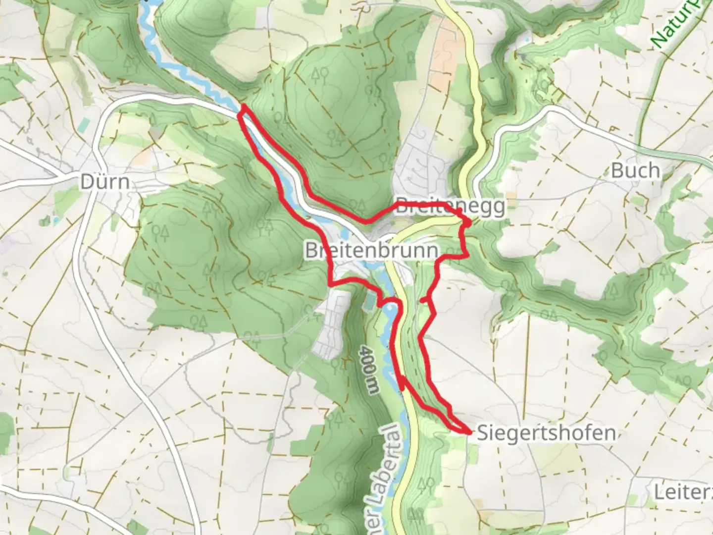 An image depicting the trail Breitenbrunn Loop via Hirchenstein and its surrounding area.