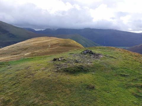 An image depicting the trail Knott Rigg Walk via Newlands Pass and its surrounding area.