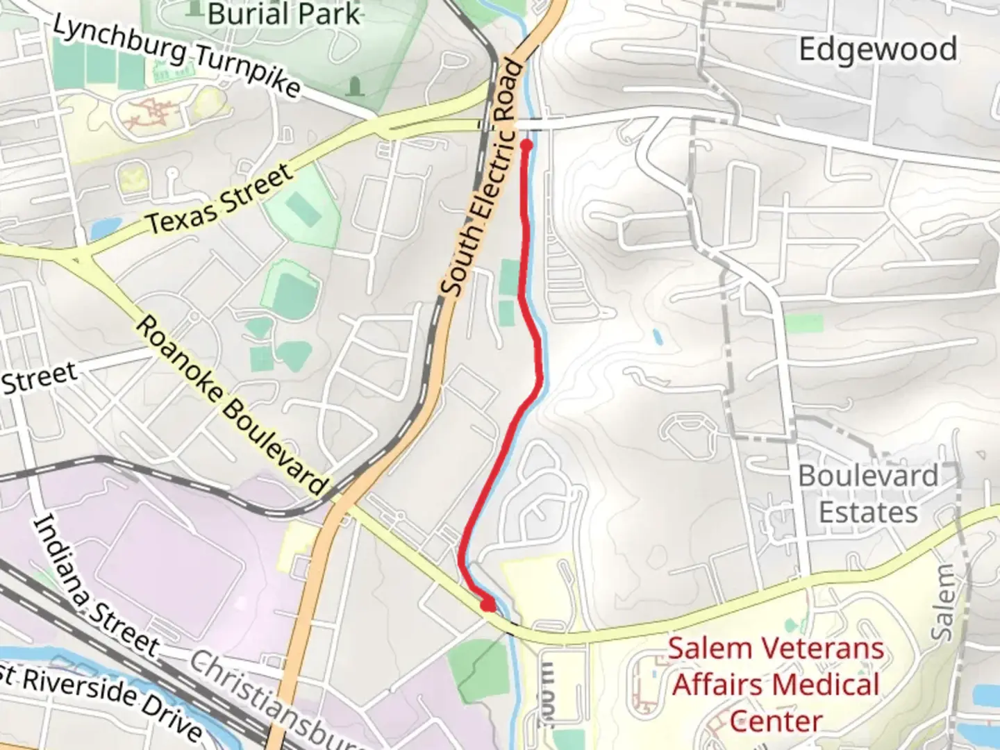 An image depicting the trail Mason Creek Greenway and its surrounding area.
