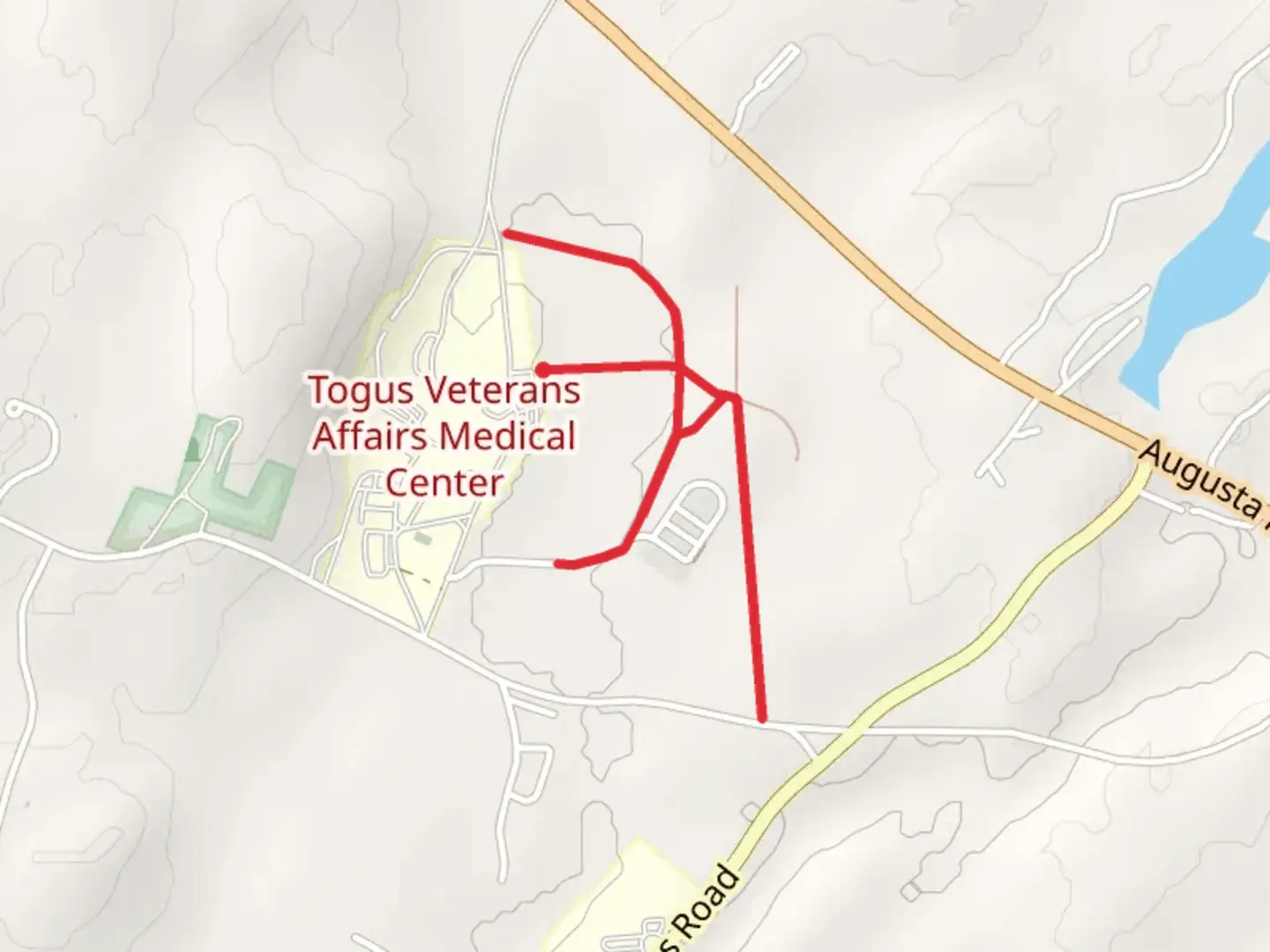 An image depicting the trail Togus National Cemetery and its surrounding area.