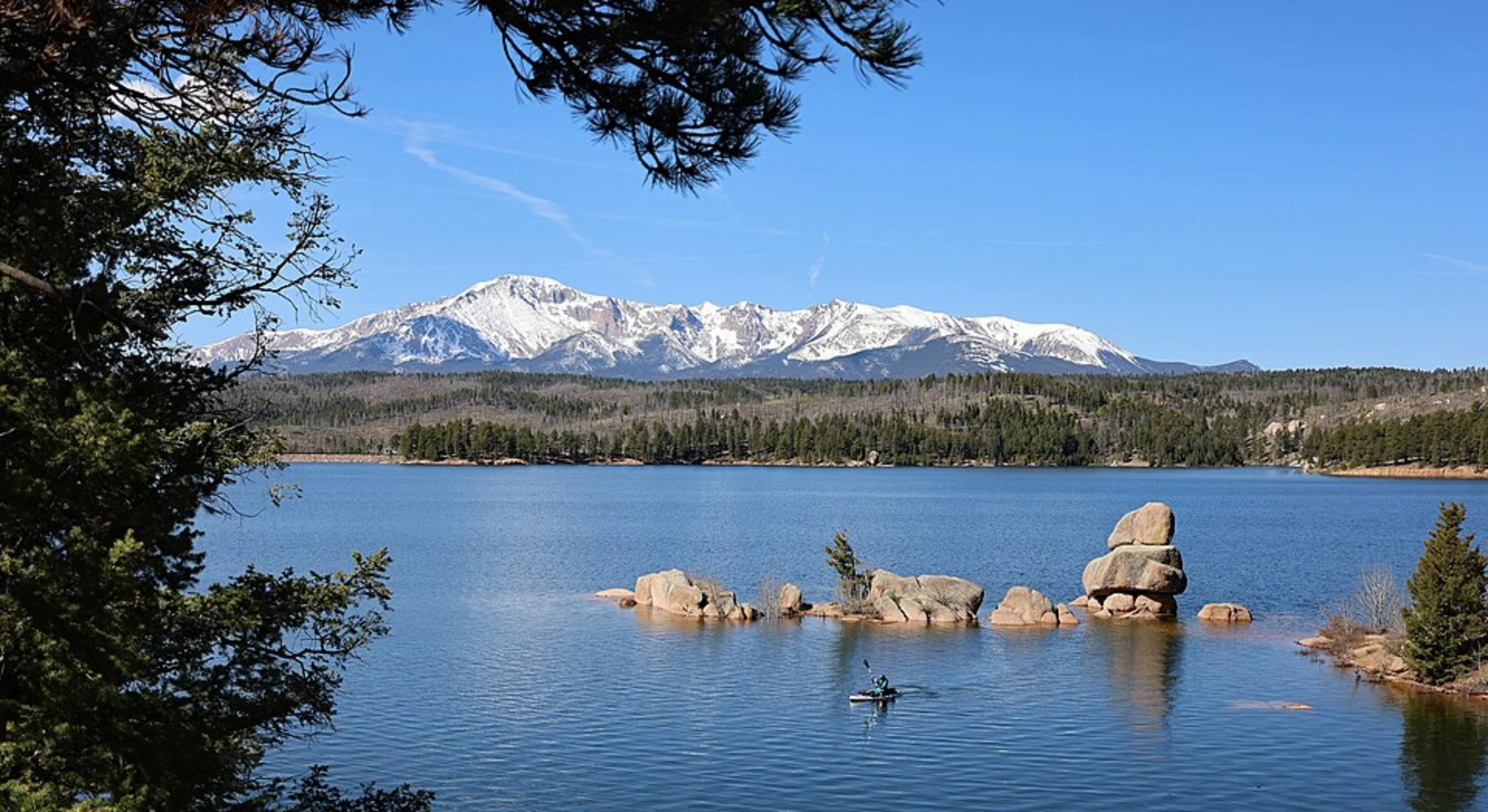 An image depicting the trail Rampart Reservoir Loop via Rainbow Gulch and its surrounding area.