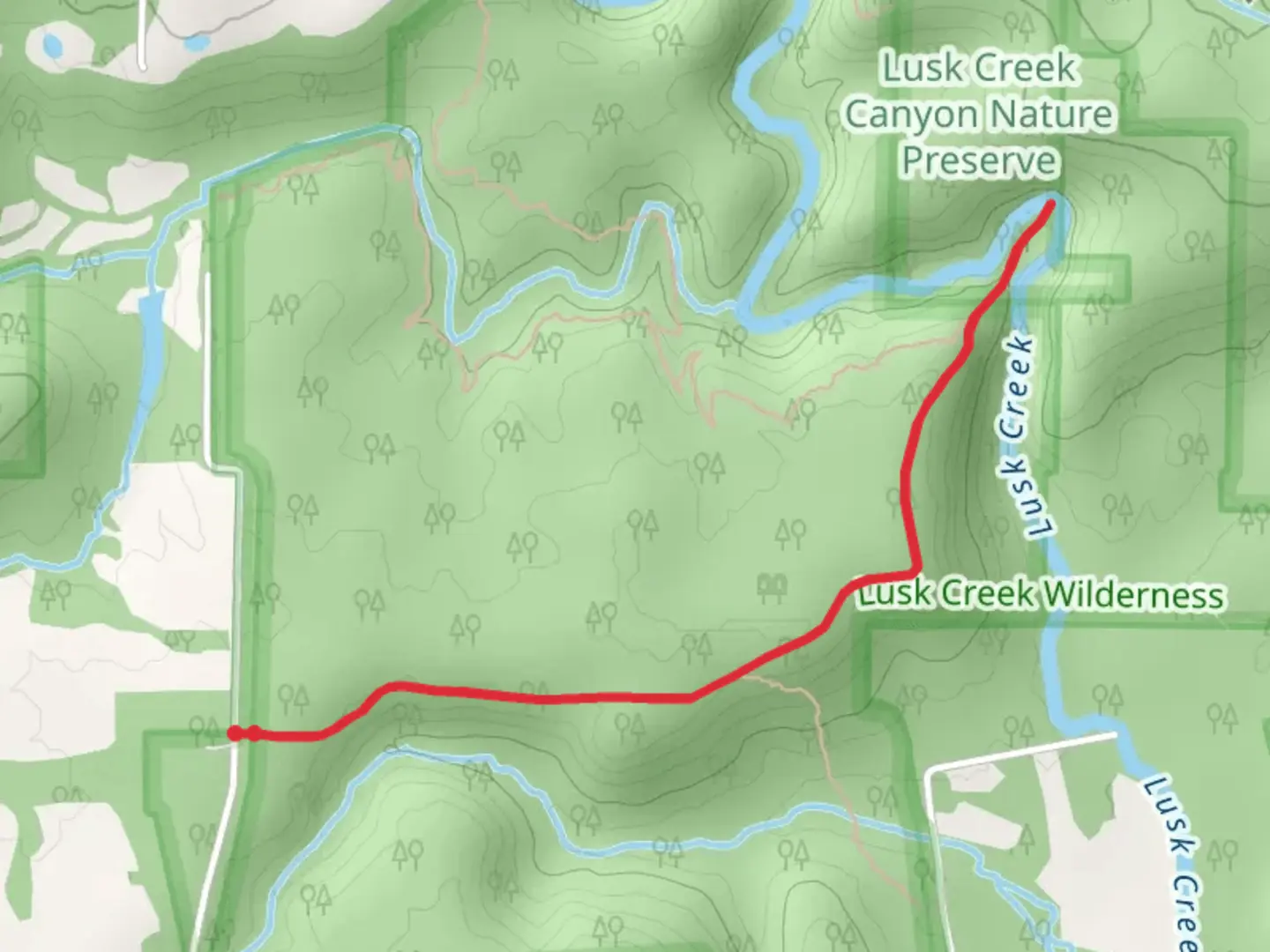 An image depicting the trail Lusk Creek Canyon Nature Preserve and its surrounding area.