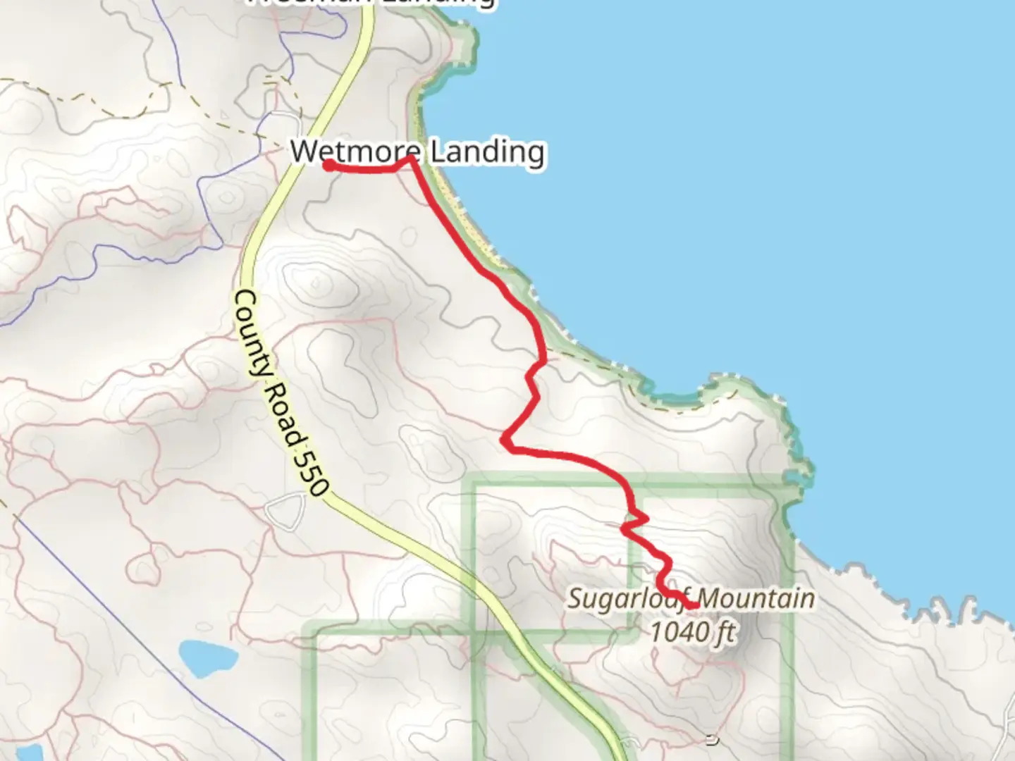 An image depicting the trail Sugarloaf Mountain via Wetmore Landing Trail and its surrounding area.