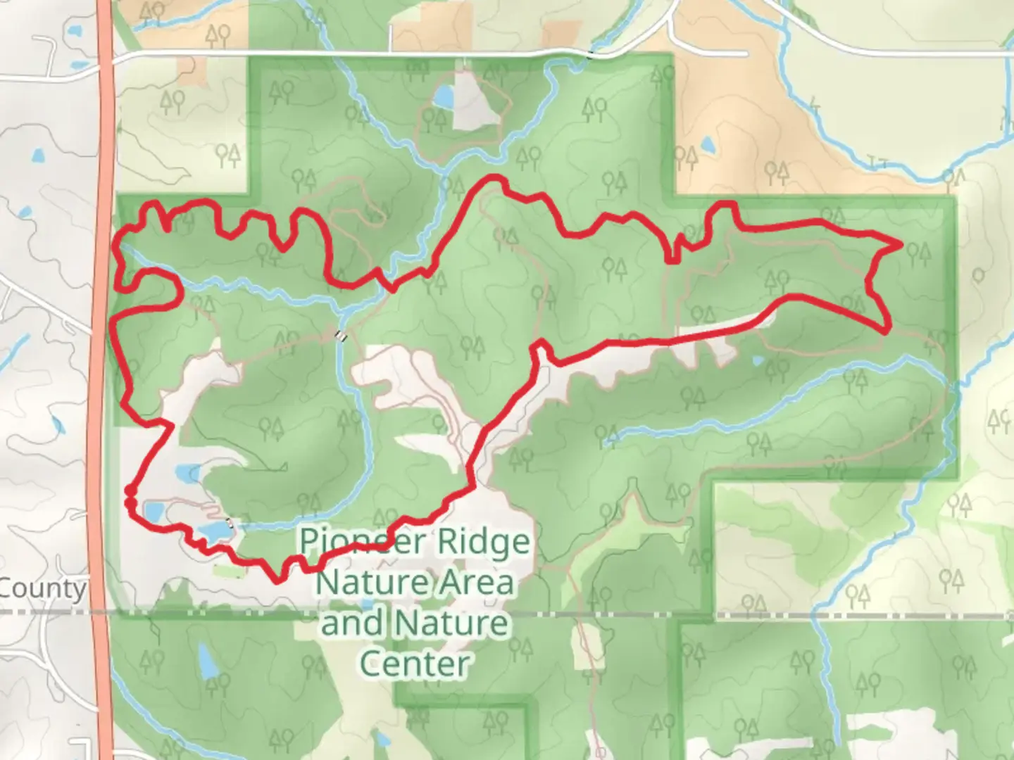 An image depicting the trail Red, Green, Blue and Yellow Loop Trail and its surrounding area.