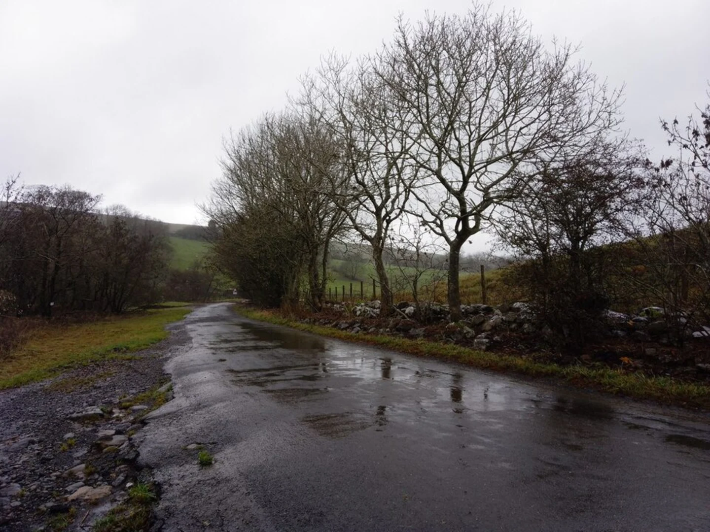 An image depicting the trail Semer Water and its surrounding area.