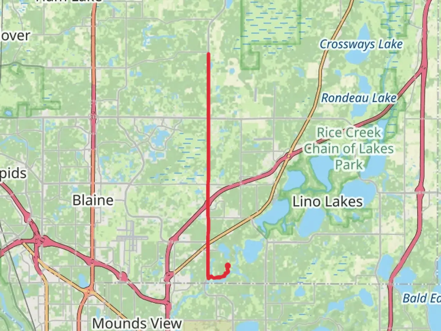 An image depicting the trail East Anoka County Regional Trail and its surrounding area.