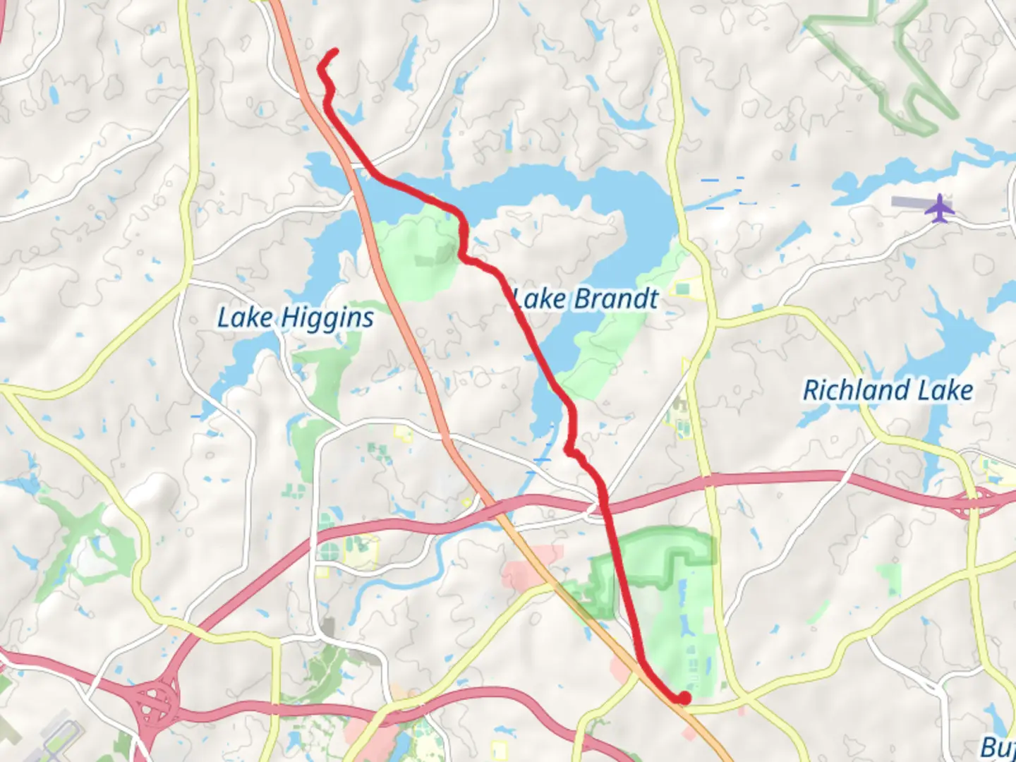 An image depicting the trail Atlantic and Yadkin Greenway and its surrounding area.