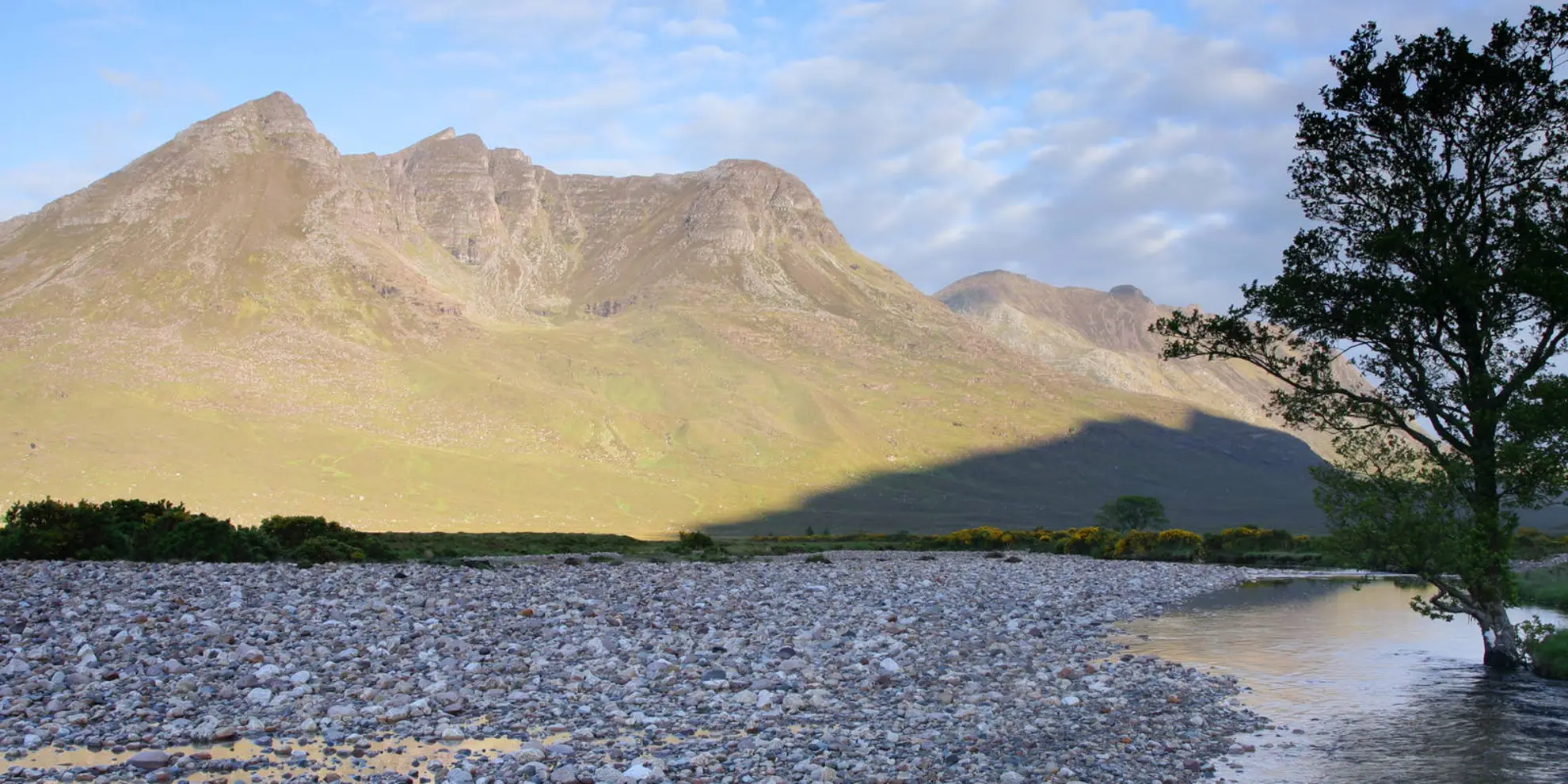 An image depicting the trail Beinn Dearg - The Four Munros Loop and its surrounding area.