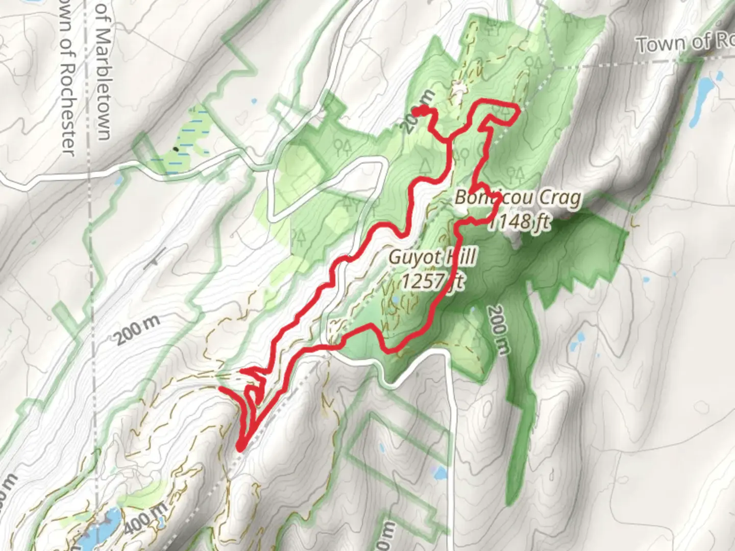 An image depicting the trail Guyot Hill Loop and its surrounding area.