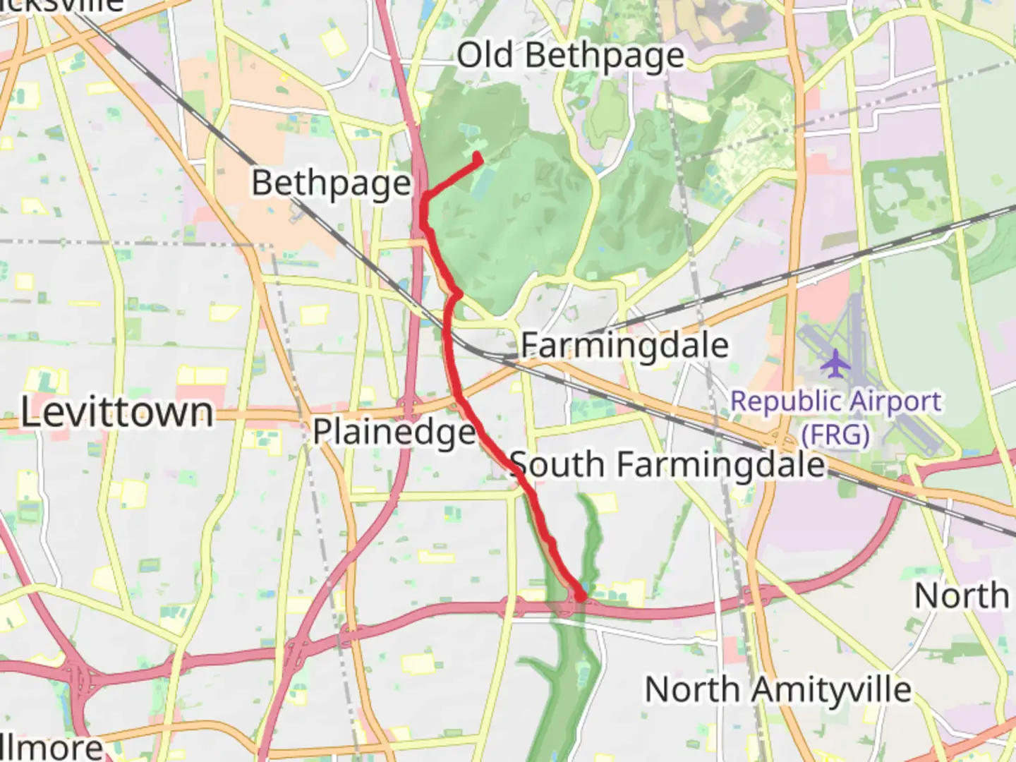 An image depicting the trail Bethpage Pathway Trail and its surrounding area.