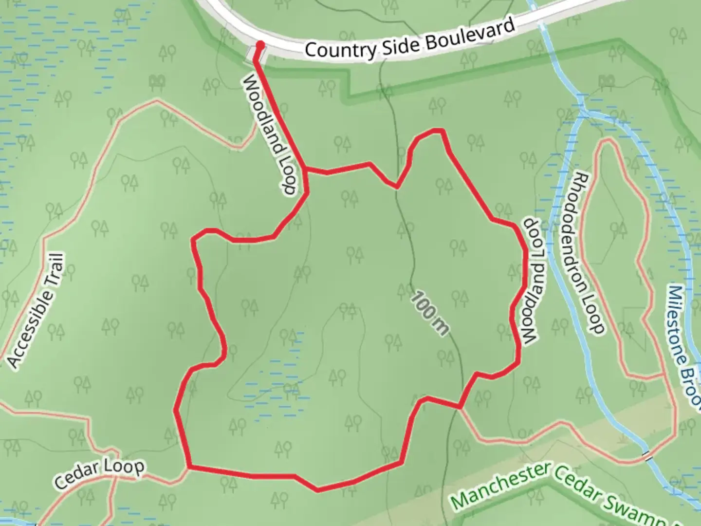 An image depicting the trail Woodland Loop and its surrounding area.