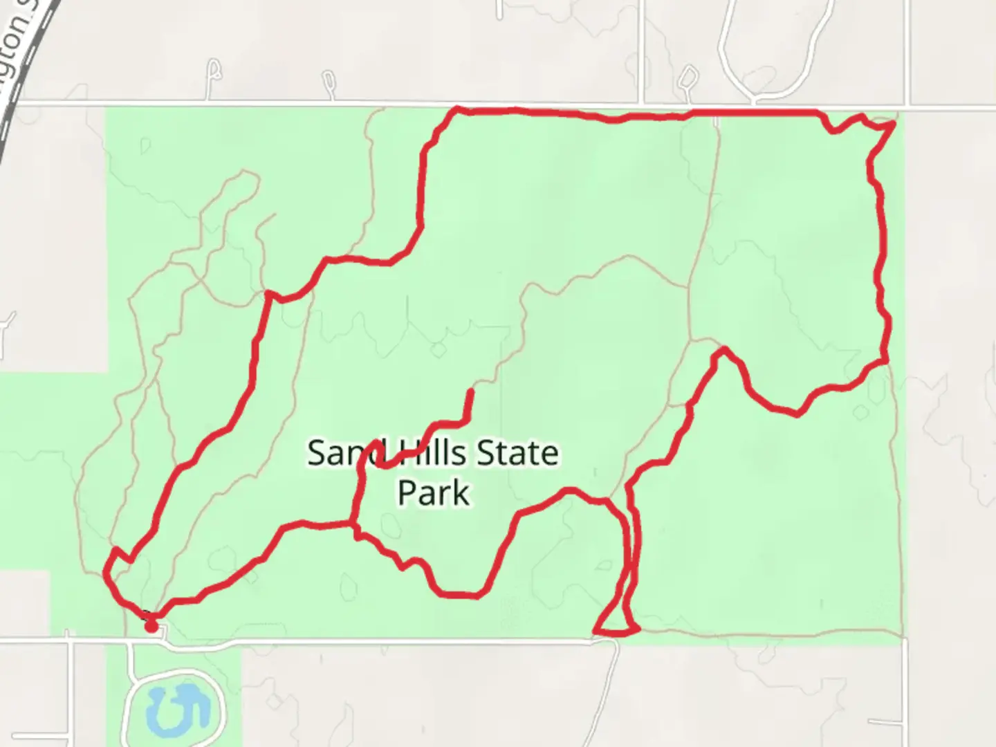 An image depicting the trail Sand Hills State Park Loop and its surrounding area.