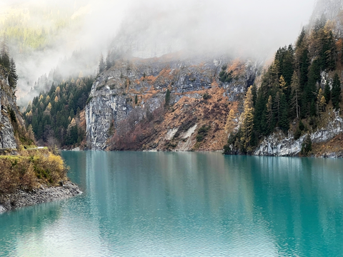 An image depicting the trail Calfeisen Valley from Gigerwaldsee and its surrounding area.