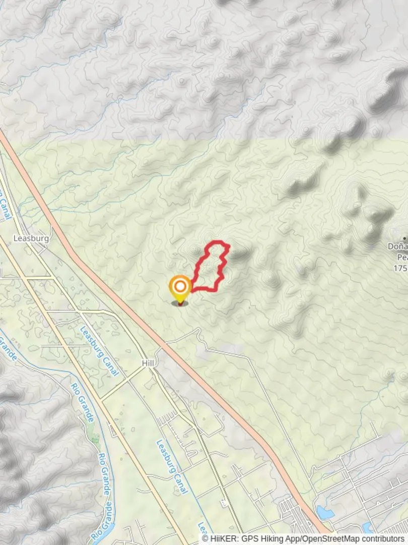 An image depicting the trail Dona Ana Arch Trail and its surrounding area.