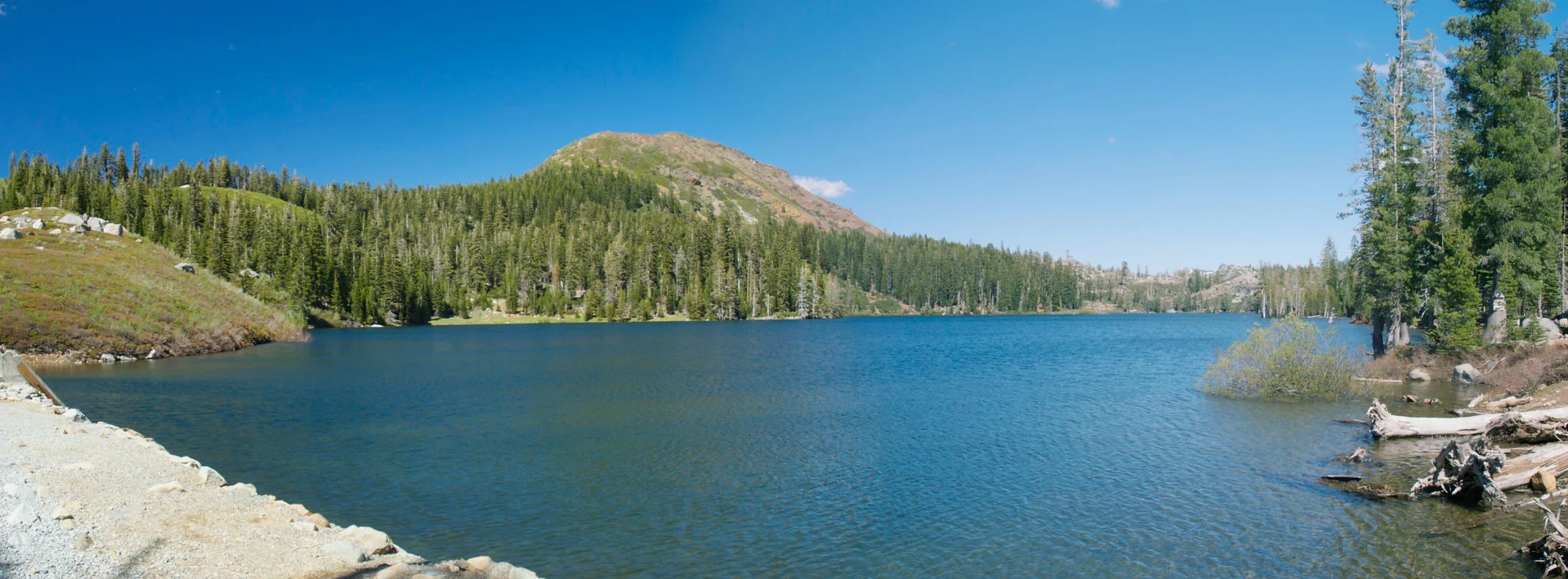 An image depicting the trail Round Lake via Grouse Ridge Trail and its surrounding area.