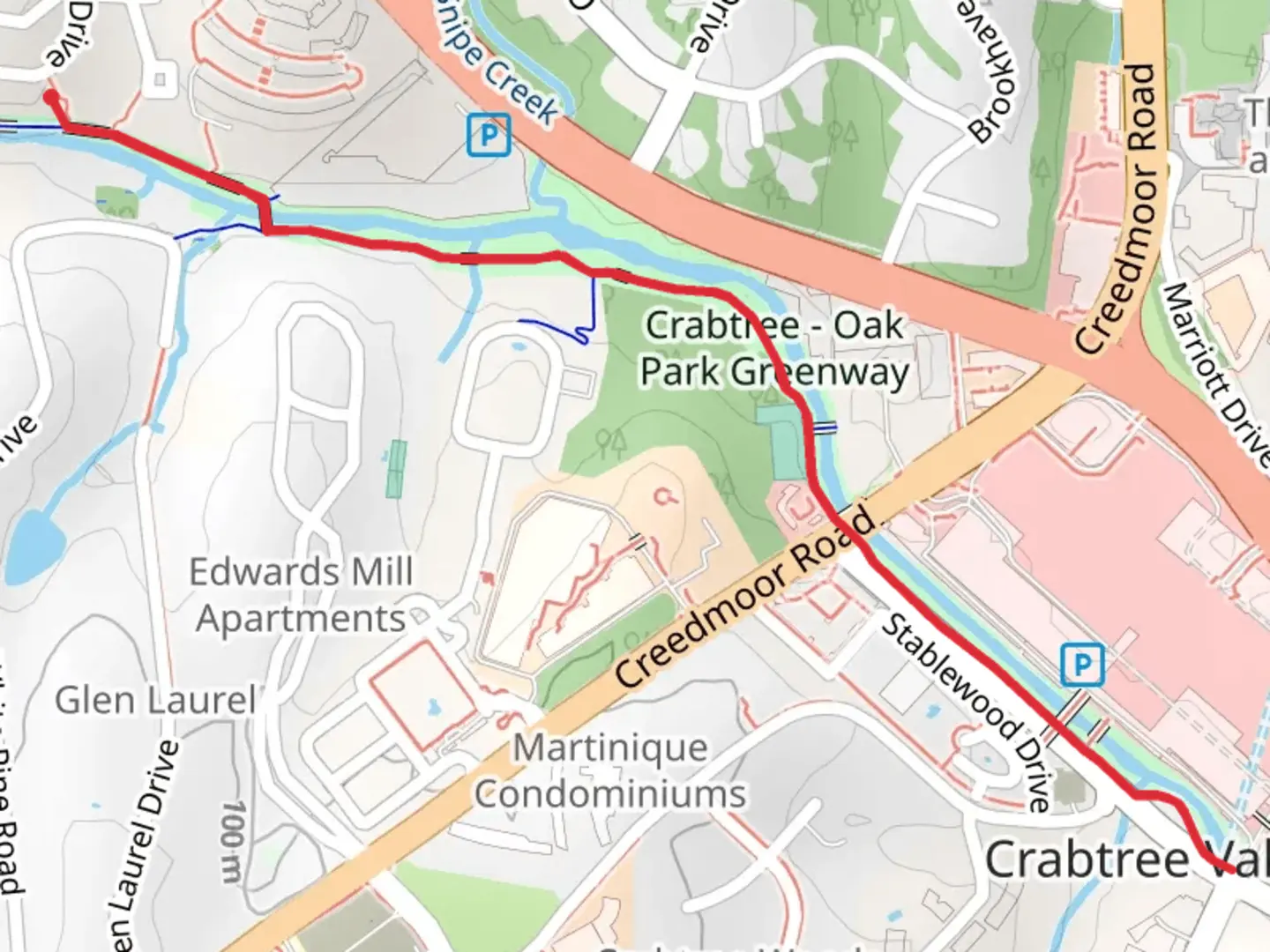 An image depicting the trail Crabtree Valley Trail and its surrounding area.