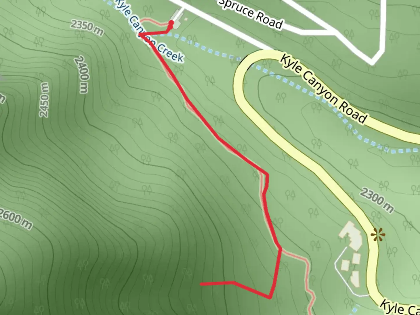 An image depicting the trail Kyle Canyon Road and its surrounding area.