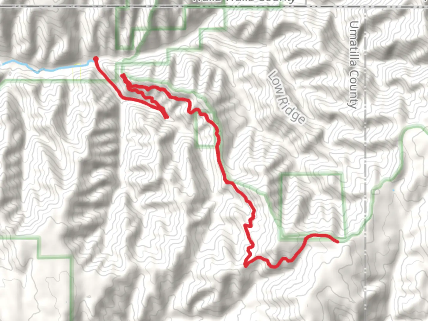 An image depicting the trail Tiger Canyon Road and its surrounding area.