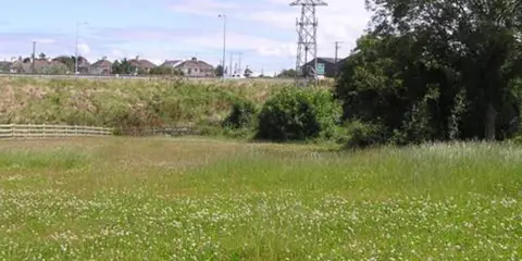 An image depicting the trail Ballygannon - Red Walk and its surrounding area.
