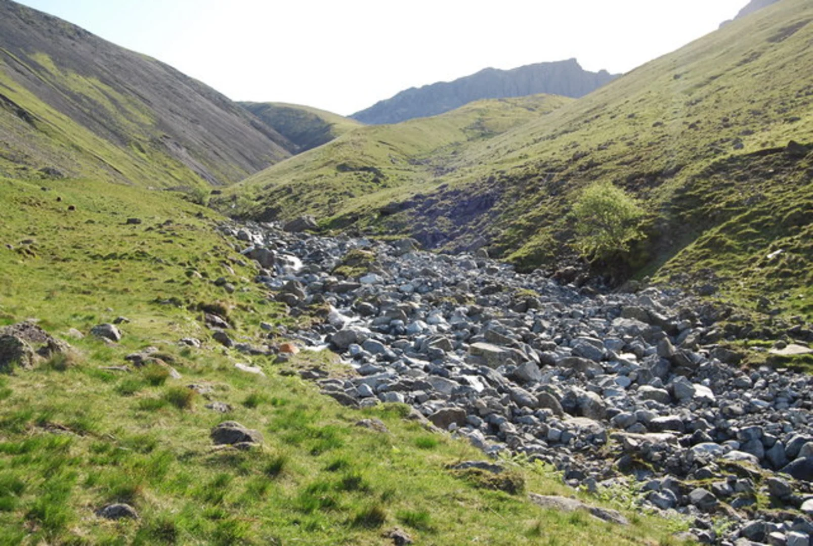 An image depicting the trail Scafell Pike and Lingmell Loop and its surrounding area.
