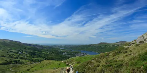 An image depicting the trail Snowdon by the Llanberis Path and its surrounding area.
