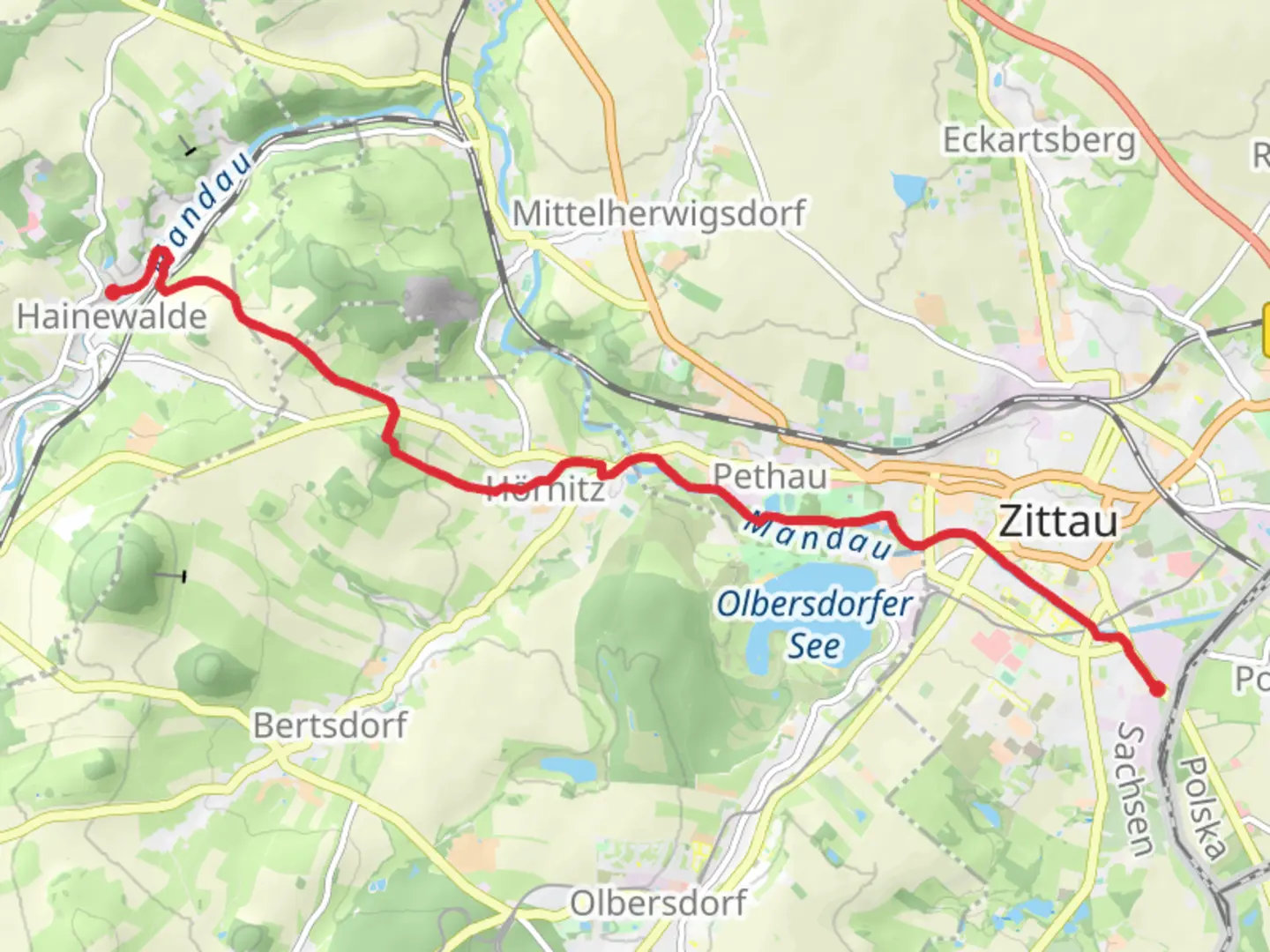 An image depicting the trail Hochschule to Hainewalde via Hainewalde - Zittau and its surrounding area.
