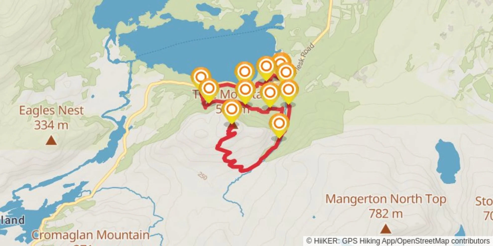 An image depicting the trail Torc Waterfall & Mountain and its surrounding area.