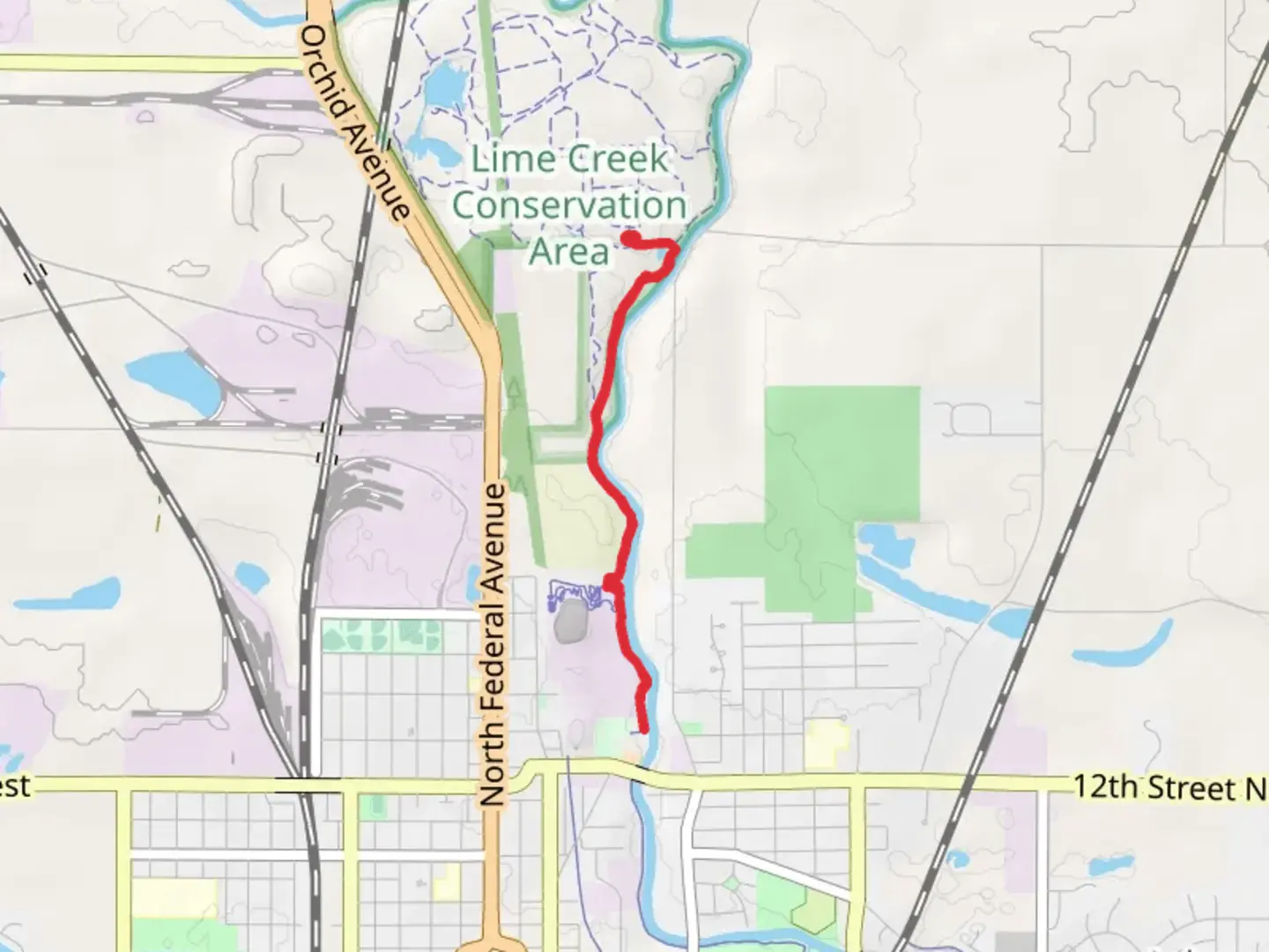 An image depicting the trail River Bluffs - Winnebago River Trail and its surrounding area.