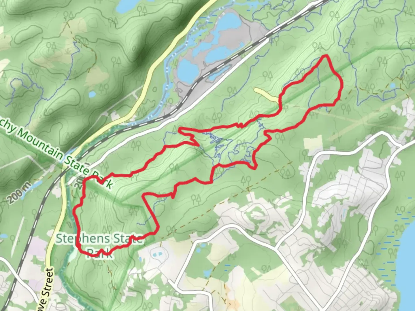 An image depicting the trail Orange, White and White Burgermeister reroute Loop and its surrounding area.