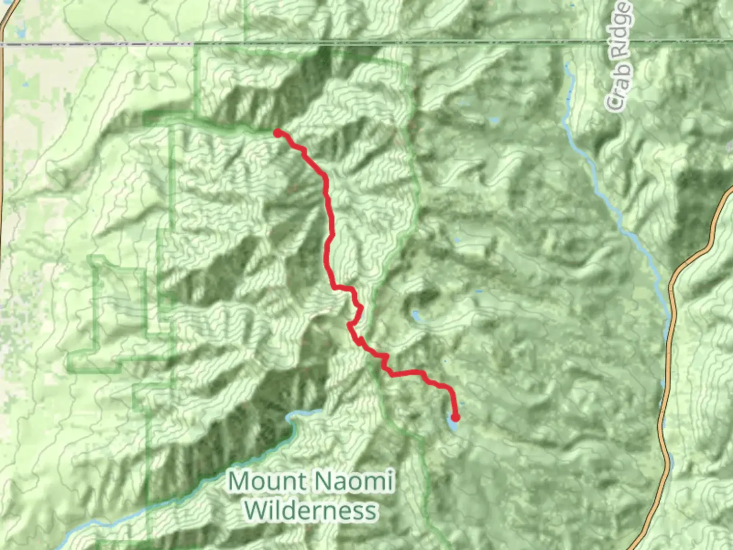 An image depicting the trail Mount Naomi NRT from Tony Grove Lake and its surrounding area.