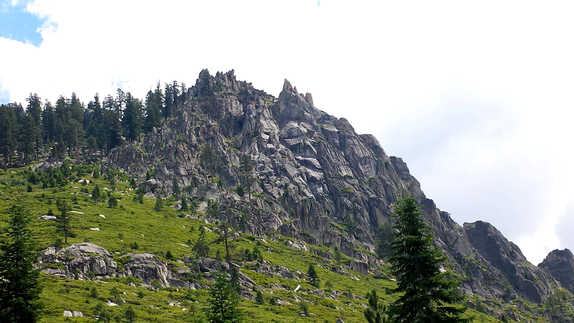 An image depicting the trail Half Moon Lake via Disaster Creek Trail and its surrounding area.