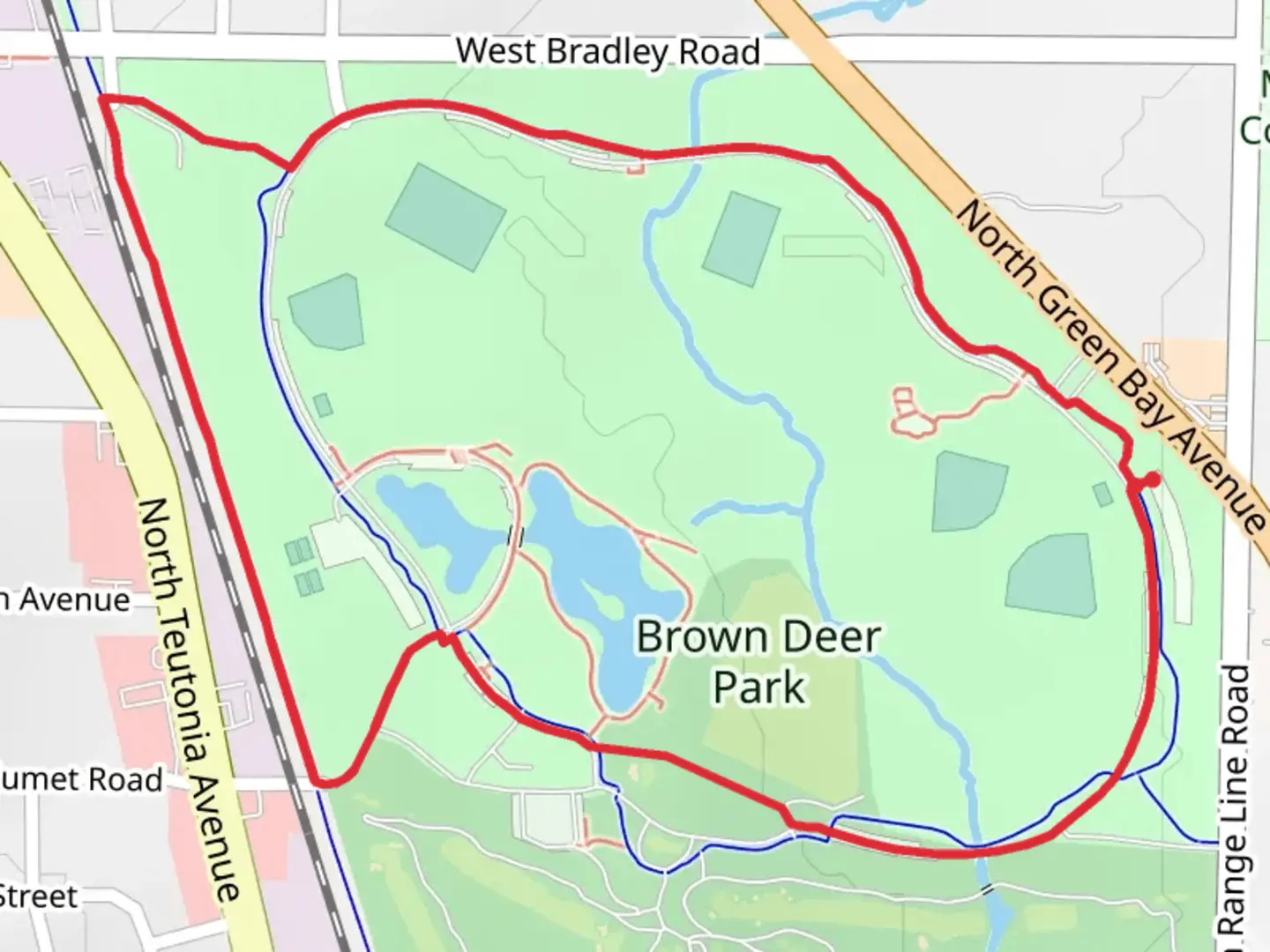 An image depicting the trail Brown Deer Park Loop and its surrounding area.