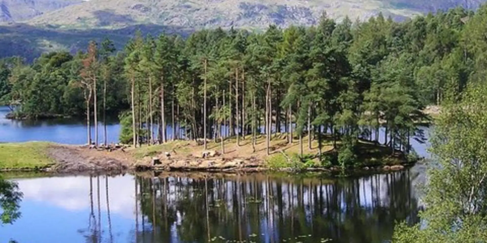 An image depicting the trail Tarn Hows Loop from Coniston Water and its surrounding area.