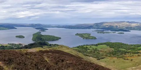 An image depicting the trail Conic Hill Loop from Balmaha and its surrounding area.