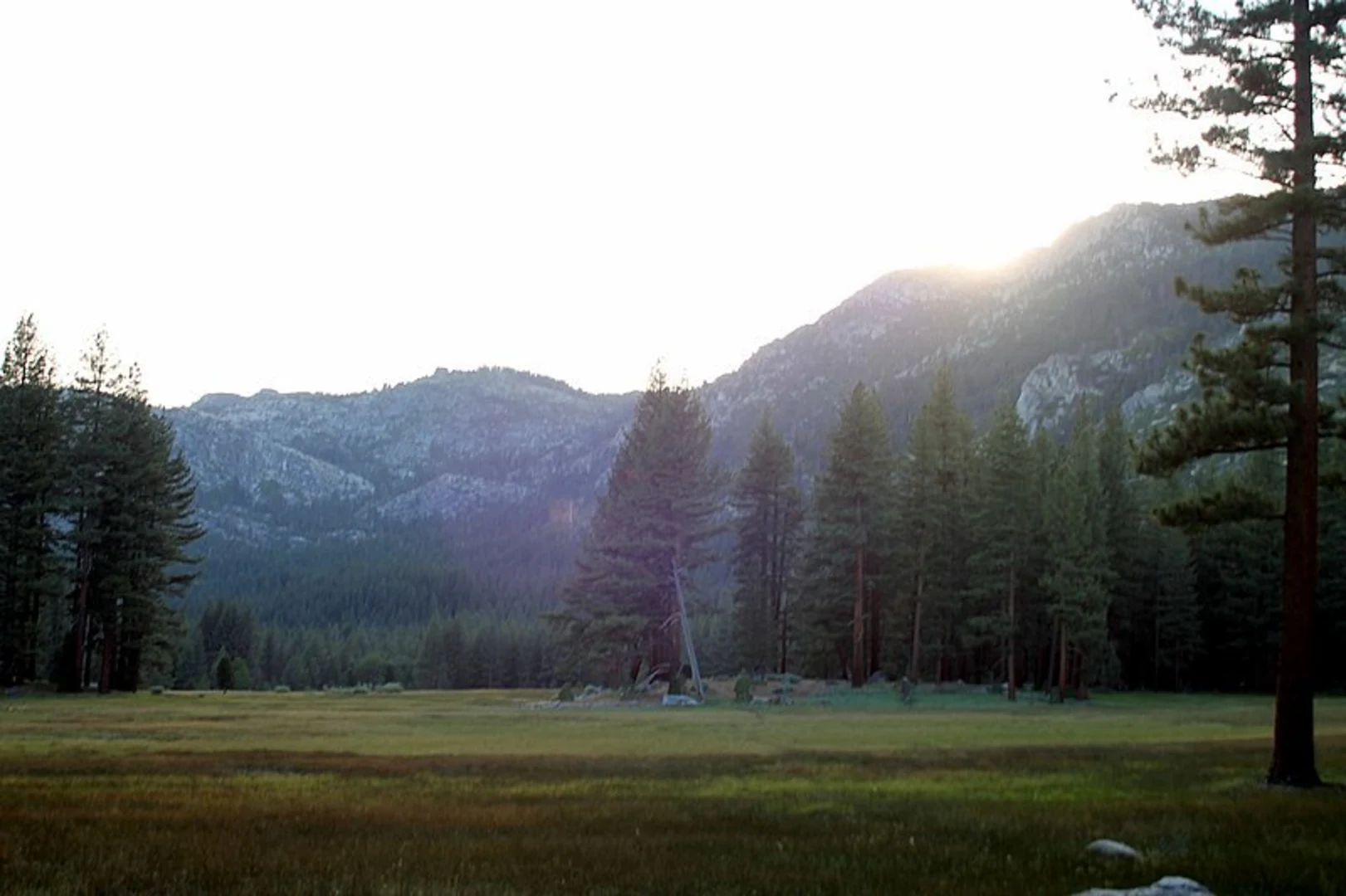 An image depicting the trail Burnside Lake via Grover Hot Springs and its surrounding area.