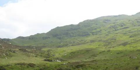 An image depicting the trail Glasgwm from Cwm Cywarch and its surrounding area.