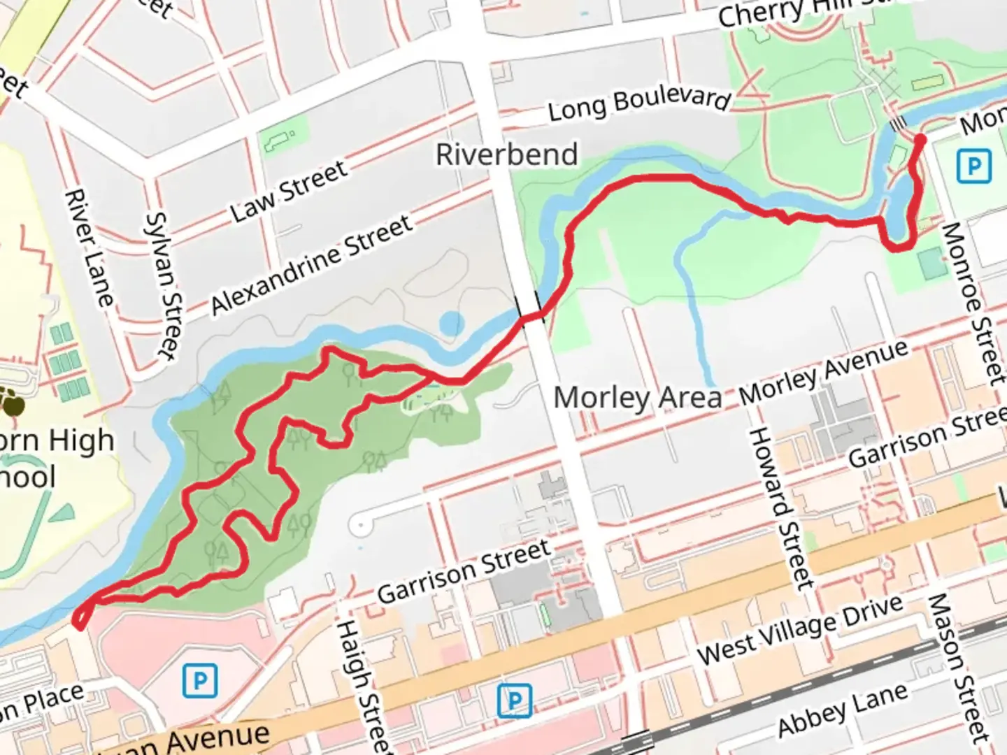 An image depicting the trail Walk beside Lower River Rogue and its surrounding area.