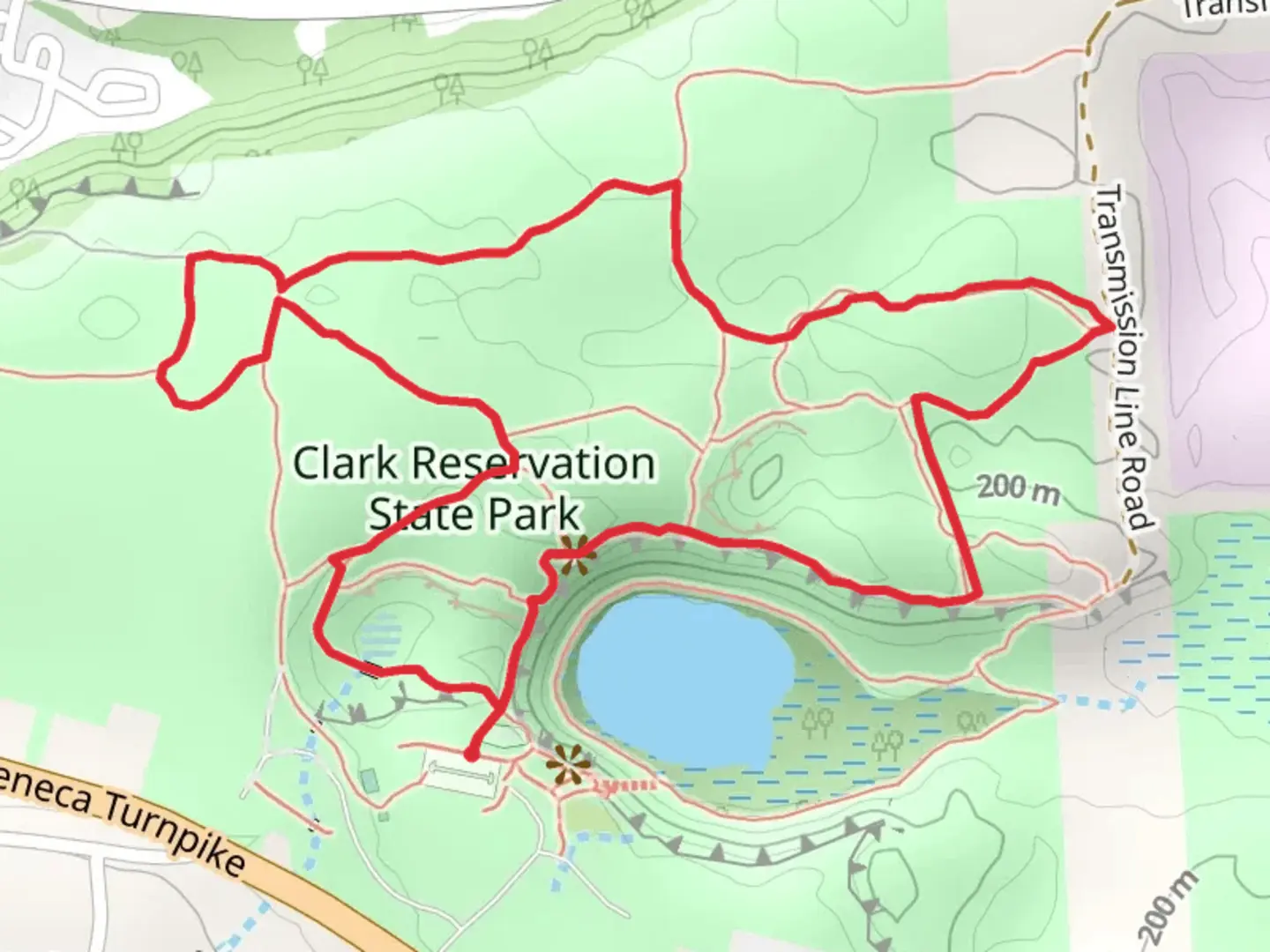 An image depicting the trail Clark Reservation State Park Loop Trail and its surrounding area.