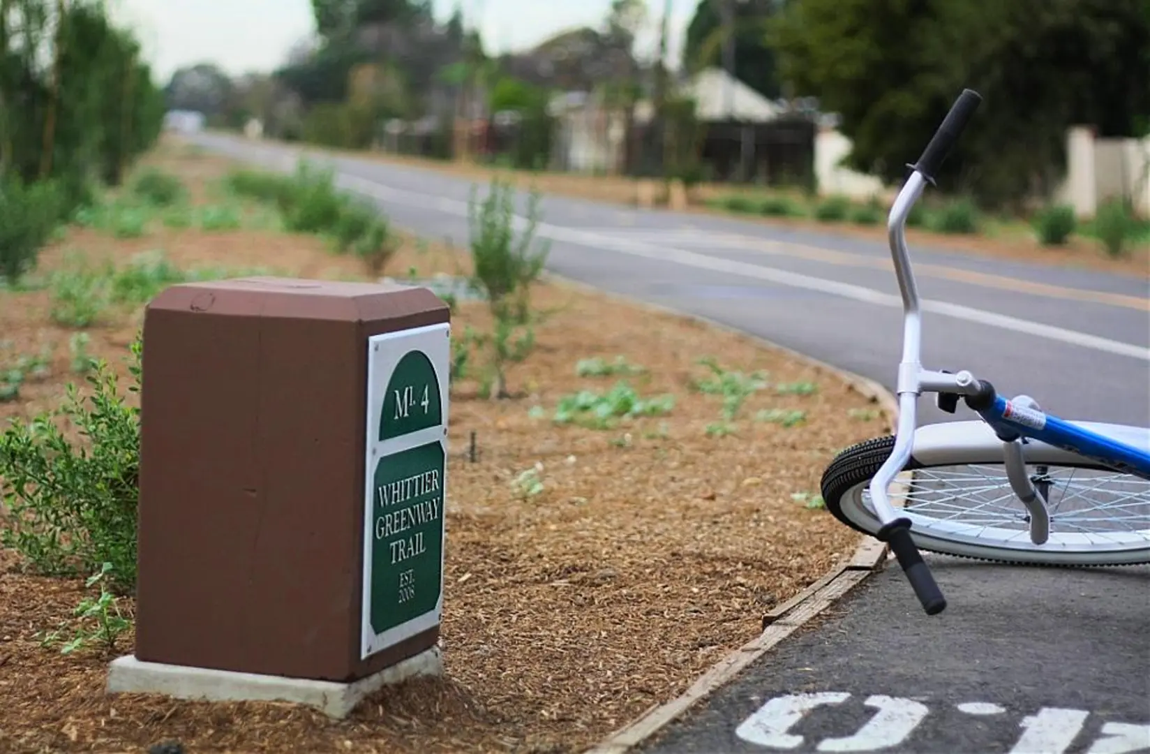 An image depicting the trail Whittier Greenway Trail and its surrounding area.