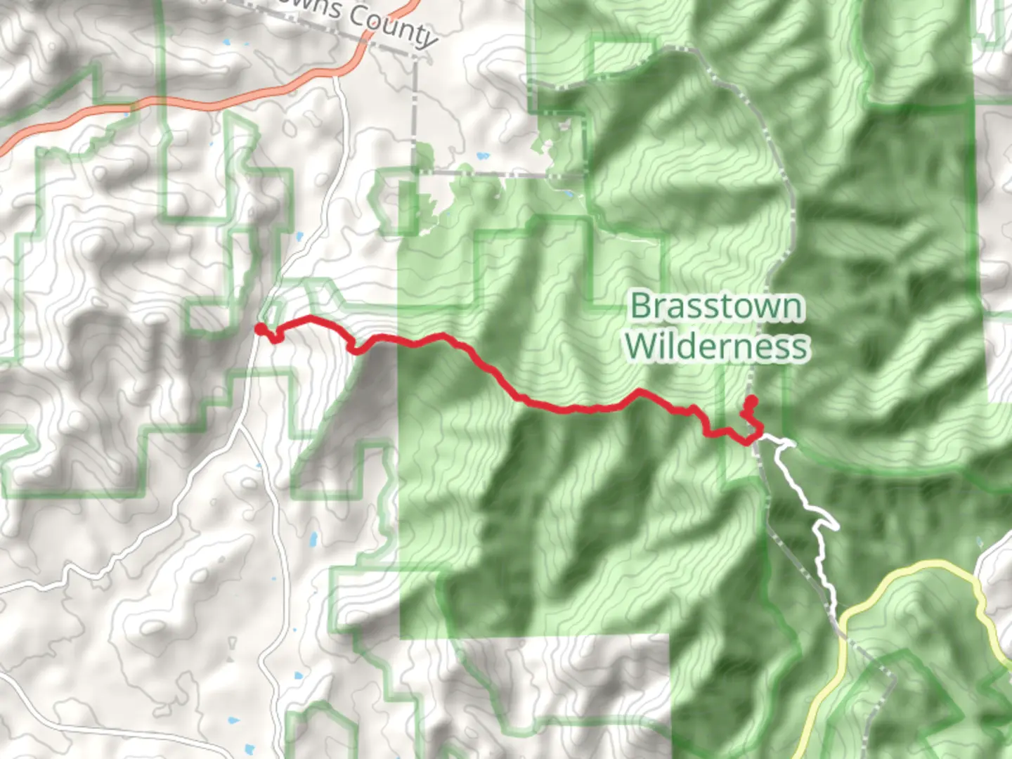 An image depicting the trail Brasstown Bald via Arkaquah Trail and its surrounding area.