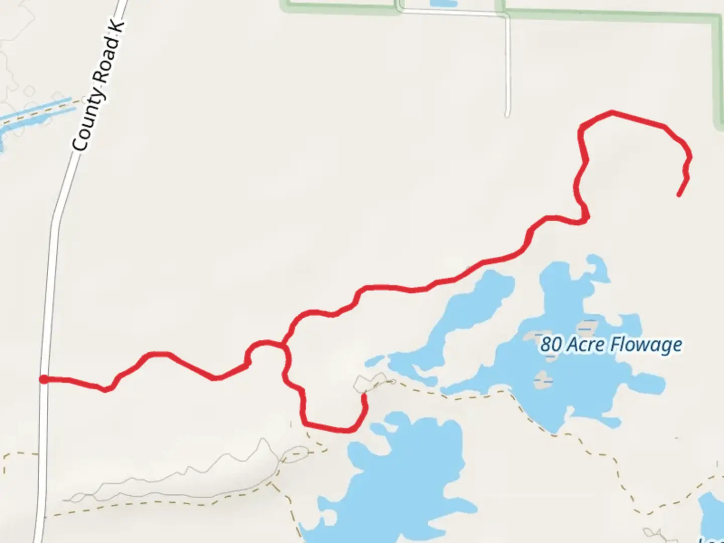 An image depicting the trail 80 Acre Flowage and its surrounding area.