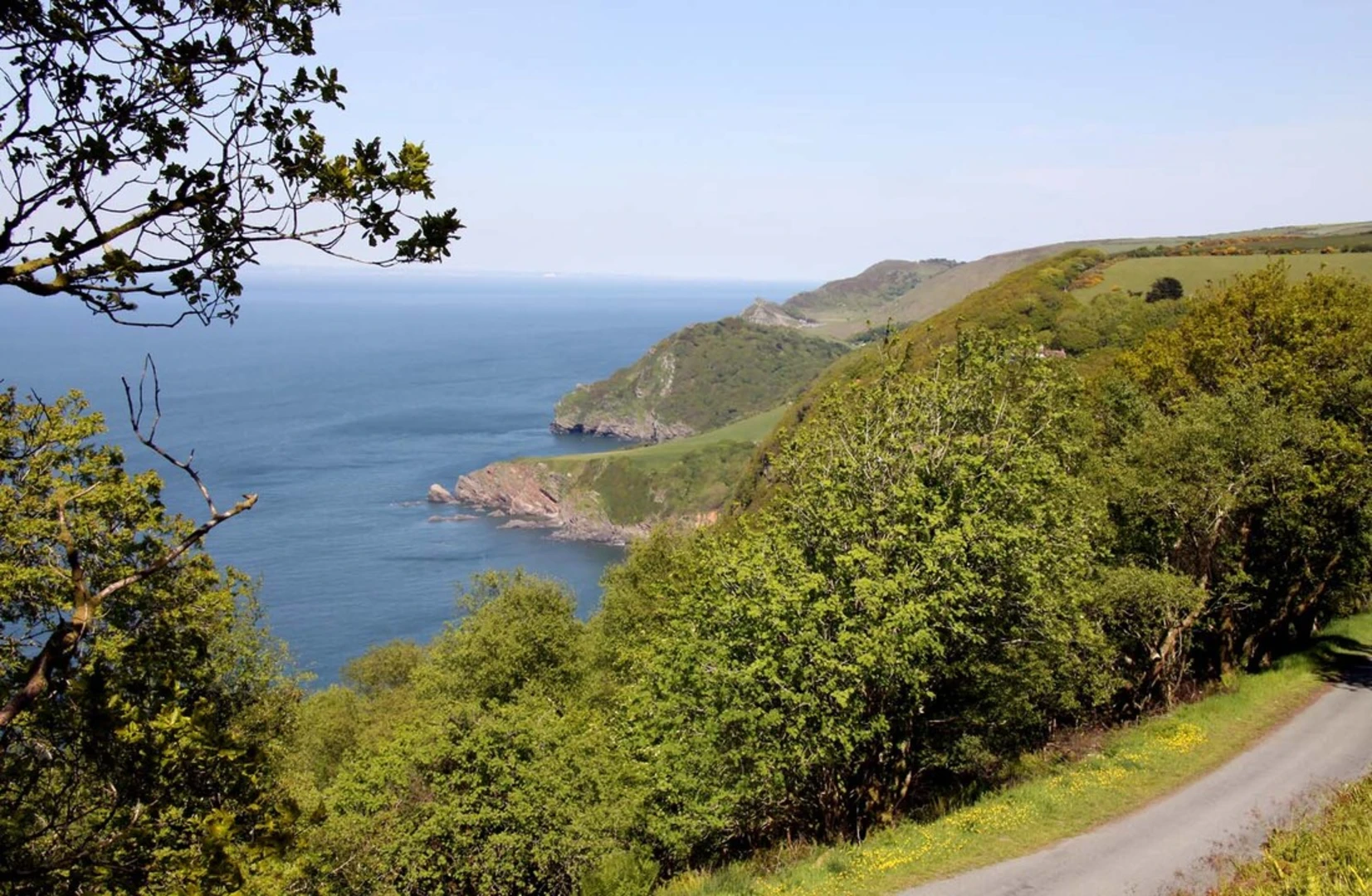 An image depicting the trail Woody Bay and its surrounding area.