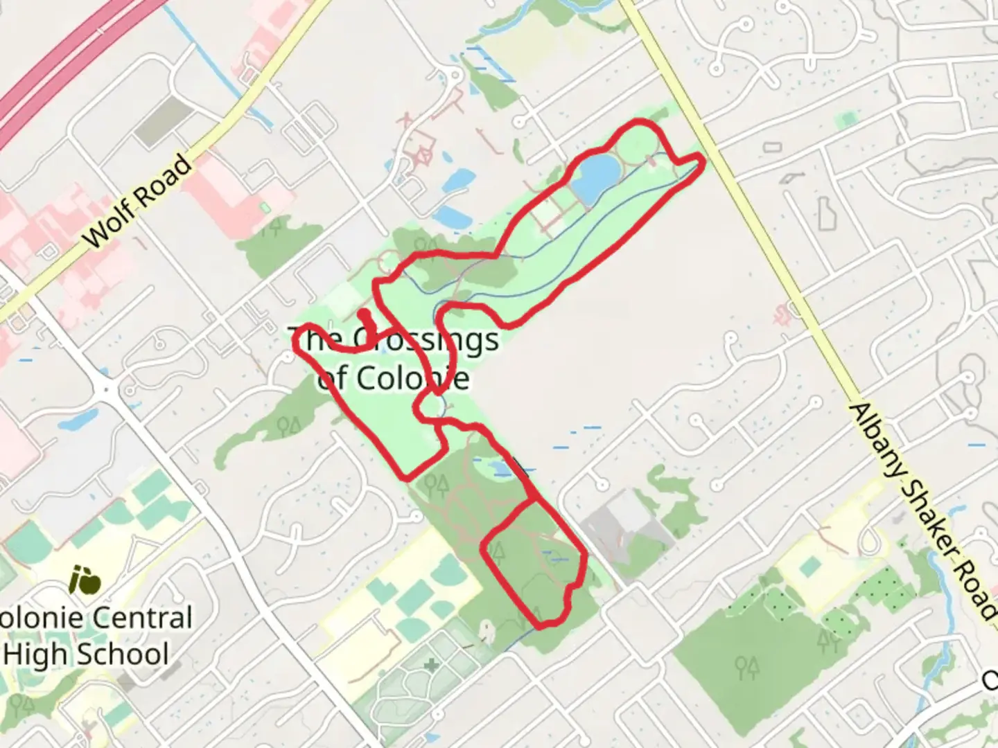 An image depicting the trail Crossings Park of Colonie Loop and its surrounding area.
