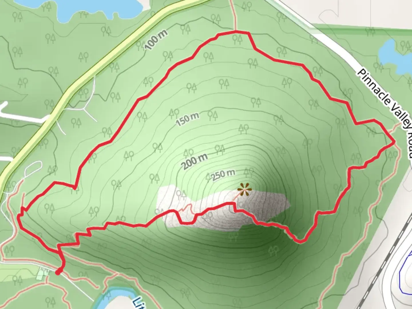 An image depicting the trail Pinnacle Mountain Loop and its surrounding area.
