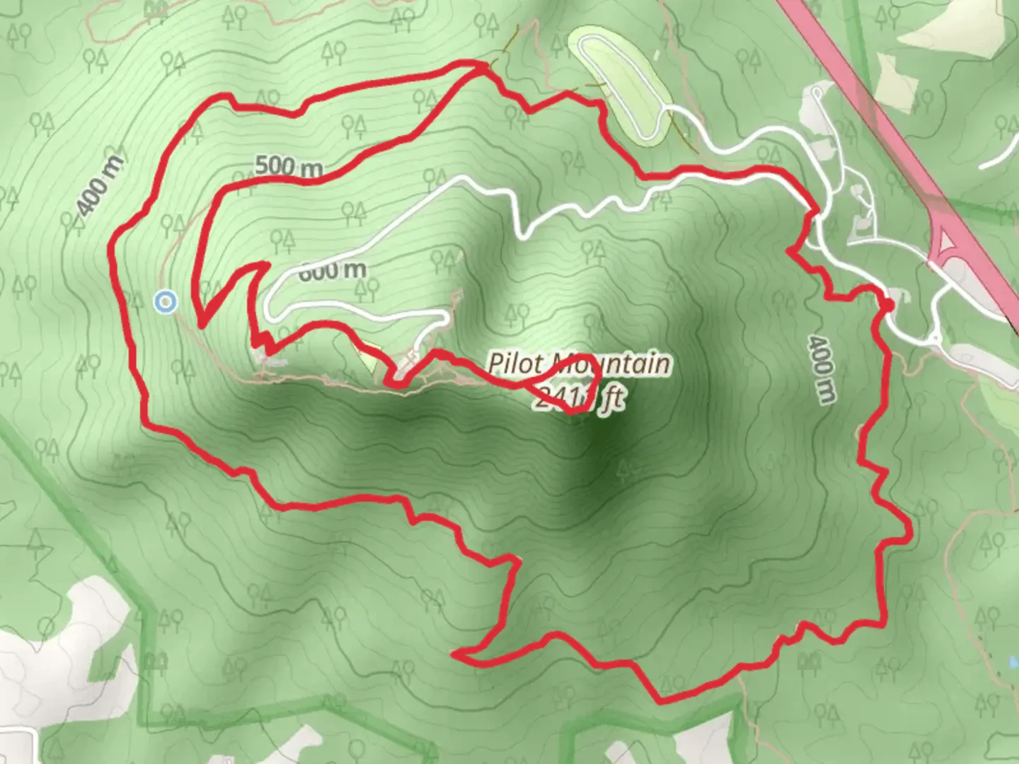 An image depicting the trail Pilot Mountain - Jomeokee and Grindstone Loop Trail and its surrounding area.