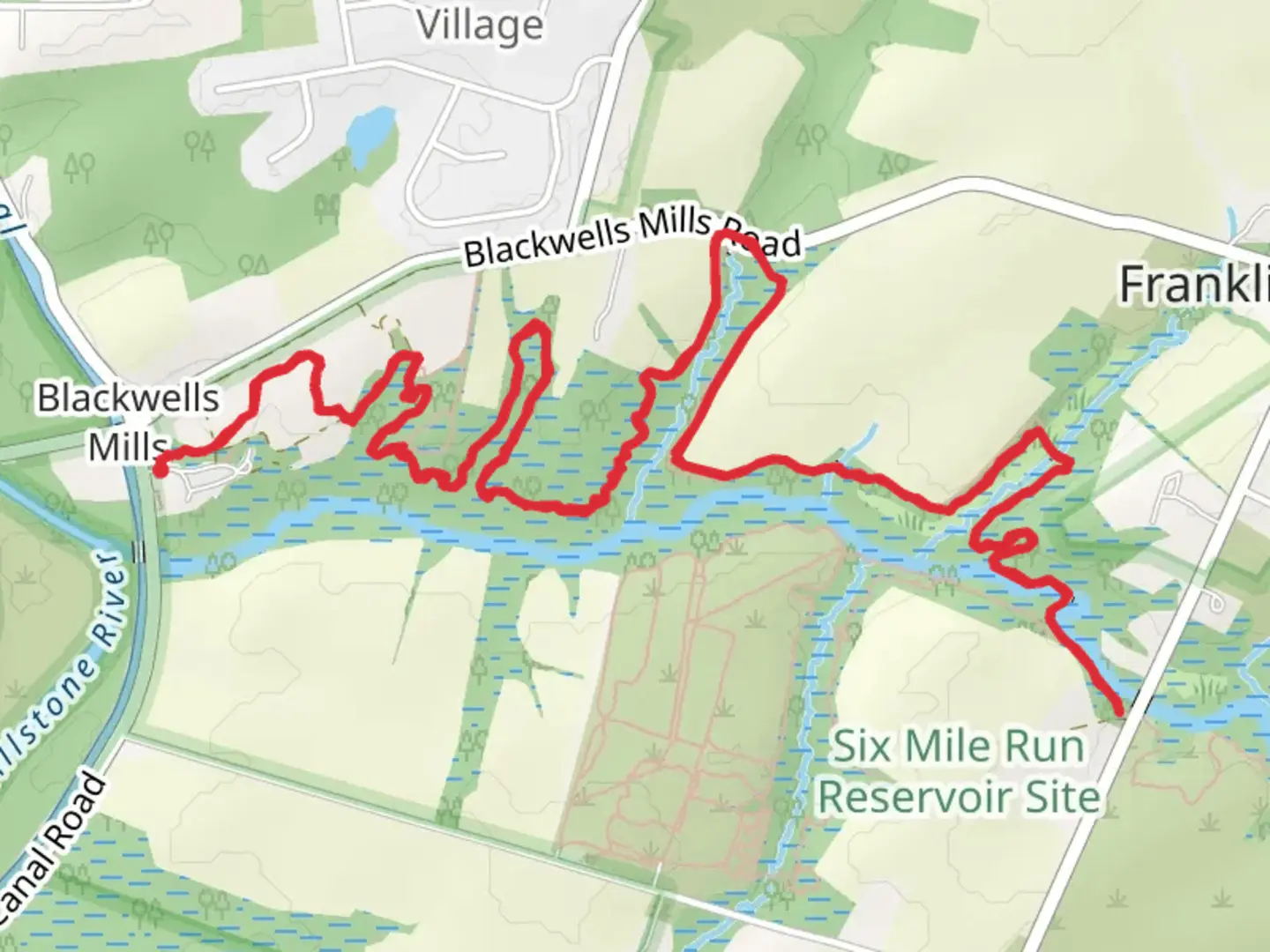 An image depicting the trail Six Mile Run - Blue Trail and its surrounding area.