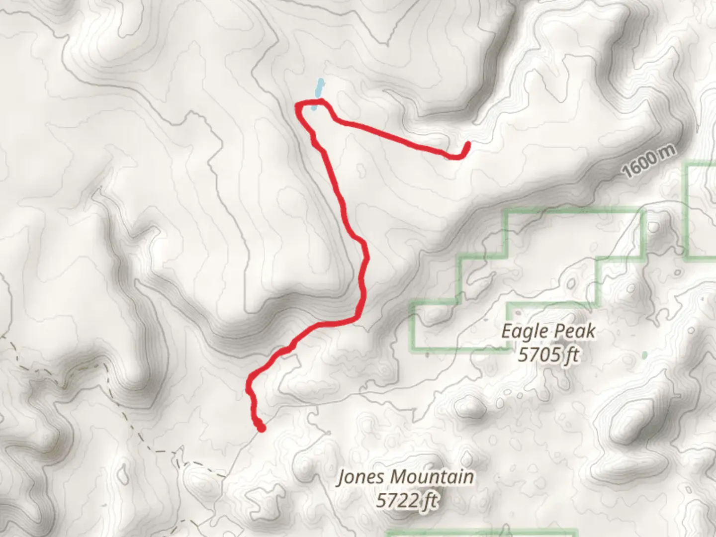 An image depicting the trail Queens Tank Trail via Tailhoit Mesa Trail and its surrounding area.
