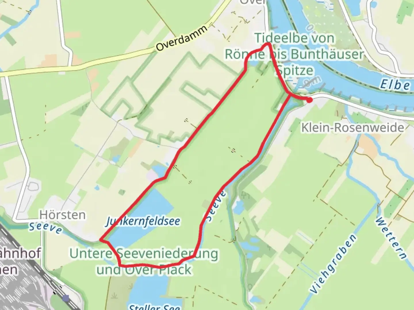 An image depicting the trail Junkernfeldsee via Wanderweg Junkernfeld and its surrounding area.