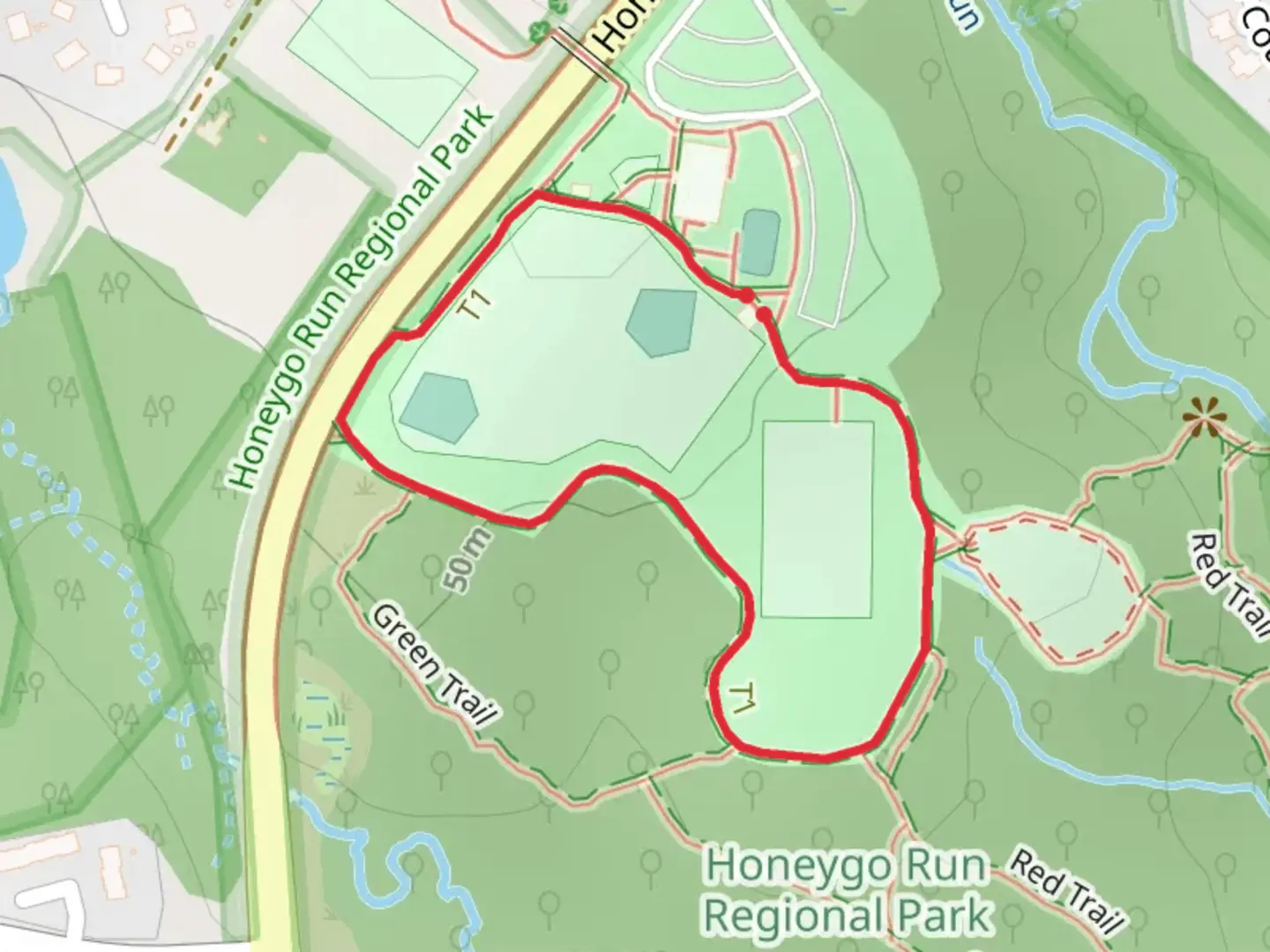 An image depicting the trail Paved Loop Path and its surrounding area.