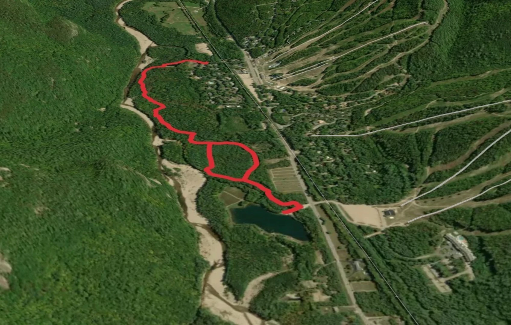 An image depicting the trail Thorne Pond via Saco River and its surrounding area.